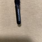 The North Face  women XS hooded sweater tan color with reflective lines Photo 4