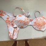 Orange and white bikini Photo 0