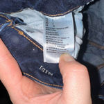 American Eagle  distressed dark wash cutoff jean shorts Photo 2