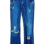 Levi's 518 Women's Superlow Boot Cut Distressed Jeans Photo 0