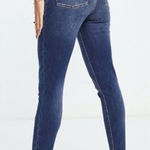 Spanx Shape and Lift high-rise distressed skinny jeans in mid wash Sz XS Petite Photo 0