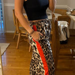 Amazon  Cheetah Print Track Pants Photo 0