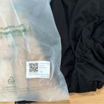 Halara  High Waisted Ruched Side Pocket Flowy Resort Skirt Black nwt XS Photo 5