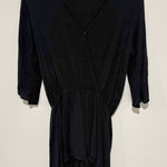 Elan  Elegant crepe V-neck faux wrap Romper black size large Photo 0