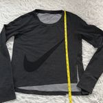 Nike  Women’s Long sleeve dri-fit top in black size Small Photo 4