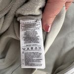 Adidas Women’s Medium  sweatshirt. Light green/gray. Striped sleeves. Photo 4