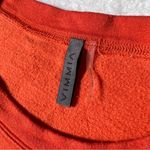 Vimmia Revolve Orange Asymmetrical Hem Sweatshirt Photo 5