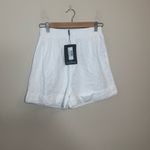 Pretty Little Thing Broiderie Anglaise Button Front Turn Up Hem Floaty Shorts Photo 1