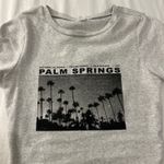 Garage Graphic Baby Tee Photo 1