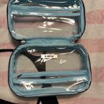 Nicole Miller  cosmetic travel see thru bag with pockets inside great for travel Photo 4