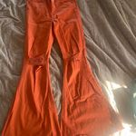 Sneak Peak Orange Flare Jeans Photo 0