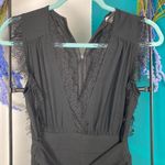Newbury Kustom Newburyport Custom sm black v neck jumpsuit ruched sides of legs. Lace trim Photo 4