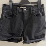 Levi's Levi’s Women’s Mid Length Jean Shorts Size 27 Black Cuffed Stretch Denim Photo 0