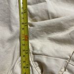 H&M  women's medium elastic waist shorts light yellow with pockets rolled hem Photo 2