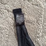 Calvin Klein  strapless bra.  Size 30c. Black. Padded. Non slip edges. Photo 4