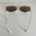 Miu Miu New with tags  56RS Sunglasses. Gold butterfly frame Photo 2