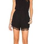 BCBGeneration Black Romper with Pockets and Lace Trim Photo 0