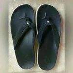 Olukai  Women's Nu'a Pi'o Sandals Flip Flop Black/Black Cream 20445-4040; 7 Photo 1