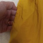 Anthropologie  Odille Drawing Parallels Pleated Pocket Skirt in Marigold Yellow Photo 5