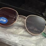 Elton John brand sunglasses with a price tag starting at $139. Gold Photo 0