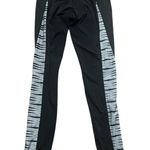 Athleta Black Leggings with Black and White Stripes Photo 1