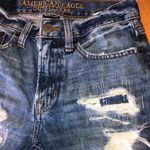American Eagle AEO slim straight distressed cut off high waist denim shorts 9 inch inseam. Photo 1