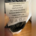 Olivia Sky  black and grey knit sleeveless turtleneck tunic top Photo 4