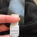 Bebe Black and White Striped Sleeveless Bodysuit Photo 15