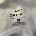 Nike Mid-Rise Cropped Tie-Dye Leggings Photo 3