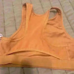 Nike dri fit bronze sports bra size xsmall Photo 3