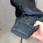 Funky 80’s 🎿 Vintage Tyrolia black puffy ski jacket belted pockets snow winter Size 10 Photo 5