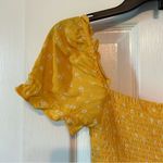 Elodie yellow floral smocked puff sleeve crop top Photo 4