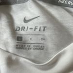 Nike tee Women’s dri-fit Running long sleeve in white size Small Photo 5