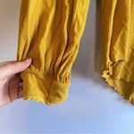 Free People  Yellow Longsleeve open back with Asymmetrical Hem and Relaxed‎ Fit Photo 3