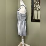 Andree by Unit  Destin to be blue & white striped smocked faux button romper Photo 3