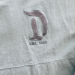 Disney Unisex Disneyland Park Resort Rare Blue GlitterSpirit Jersey Size Small Bounding Photo 3