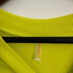 Free people Movement tempo long sleeve oversized tee in size
Medium Yellow Photo 4