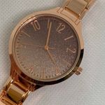 Women rose gold tone watch 35mm round case quartz analog bracelet 7.5” running Photo 1