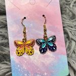Butterfly earrings blue orange yellow white black Photo 0