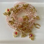 Elegant Pink and Gold Charm Bracelets Photo 0