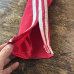 Adidas Red  track pants size xs Photo 1
