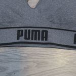 Puma  women's padded sports sporty exercise bra in gray and black size small. Photo 1