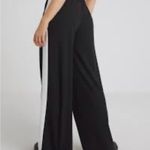 Stylish Black Boyfriend Jeans with White Side Stripe Size M Photo 2