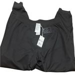 FIGS  Women's Black Jeggings with Teal Accent and  lined Photo 1