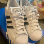Adidas  Superstars in white and black Photo 0