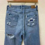 American Eagle ⭐️  light wash distressed mom jeans in size 4 Photo 4