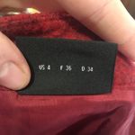 Akris two tone red wool pencil skirt, front slit with faux leather panel behind Photo 2