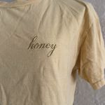 Brandy Melville John Galt Yellow Honey T-Shirt Photo 2