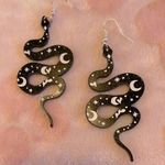 Black Snake Earrings with Celestial Design Photo 1