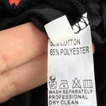 Boutique branded Velvet Jogger Pants with side split
Black Women’s Size Small Photo 6